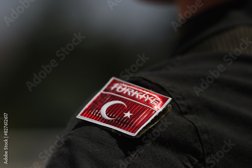 Details with the Turkish flag on the uniform of a Turkish soldier.