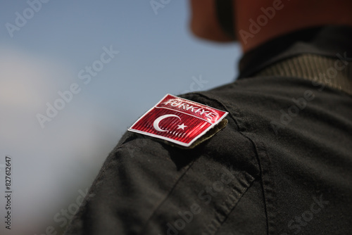Details with the Turkish flag on the uniform of a Turkish soldier.