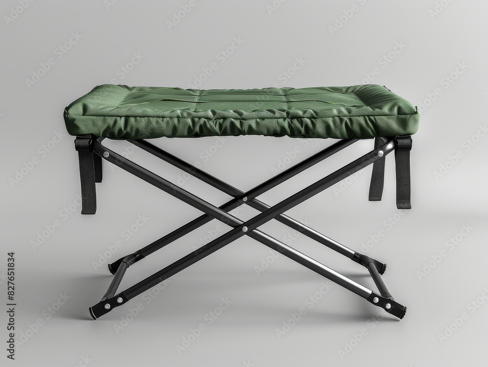 The image shows a simple, functional and comfortable camping chair with a green cushion and black metal frame, isolated on a white background. The image shows a simple, functional and comfortable camping chair with a green cushion and black metal frame, isolated on a white background.