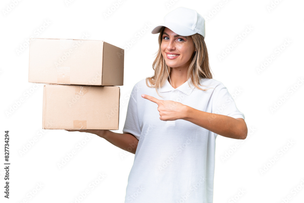 Delivery Uruguayan woman over isolated background pointing back Delivery Uruguayan woman over isolated background pointing back