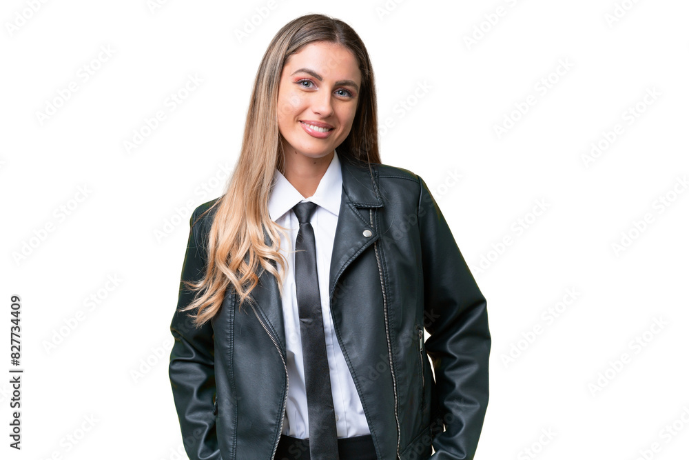 Business pretty Uruguayan woman wearing a biker jacket over isolated background laughing Business pretty Uruguayan woman wearing a biker jacket over isolated background laughing