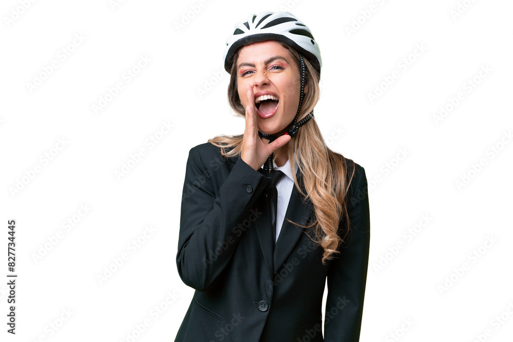 Business Uruguayan woman wearing a helmet biker over isolated background shouting with mouth wide open Business Uruguayan woman wearing a helmet biker over isolated background shouting with mouth wide open