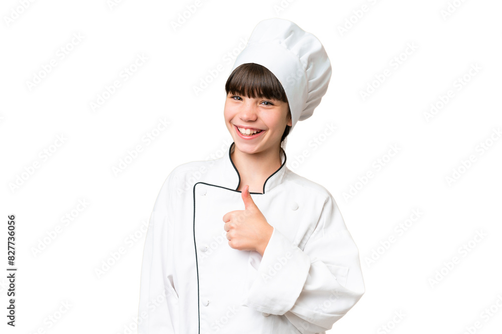 Little caucasian chef girl over isolated background giving a thumbs up gesture Little caucasian chef girl over isolated background giving a thumbs up gesture