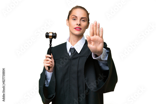 Fotografie Judge caucasian woman over isolated background making stop gesture