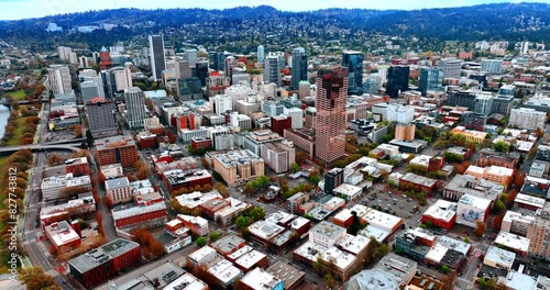 Portland panorama at daytime from drone footage. Multi-storied and high-rise buildings in the urban landscape of the city. photo
