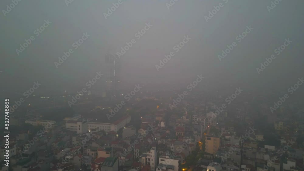 Aerial view of Hanoi Downtown Skyline with fog mist, Vietnam. Financial district and business centers in smart urban city in Asia. Skyscraper and high-rise buildings. Aerial view of Hanoi Downtown Skyline with fog mist, Vietnam. Financial district and business centers in smart urban city in Asia. Skyscraper and high-rise buildings.