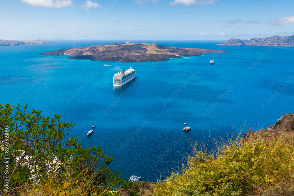 Santorini island, Greece. Cruise ship near the coast.