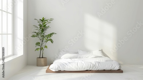 Minimalist bedroom with a simple futon bed, white linens, and a single potted plant in the corner © Jiraphiphat