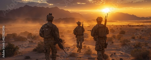 Soldiers in full gear walking through desert terrain photo