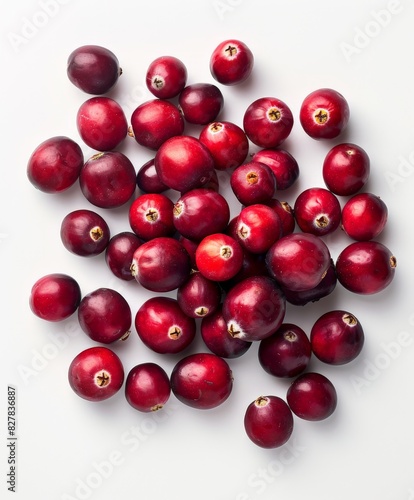 A Pile of Cranberries on a White Surface