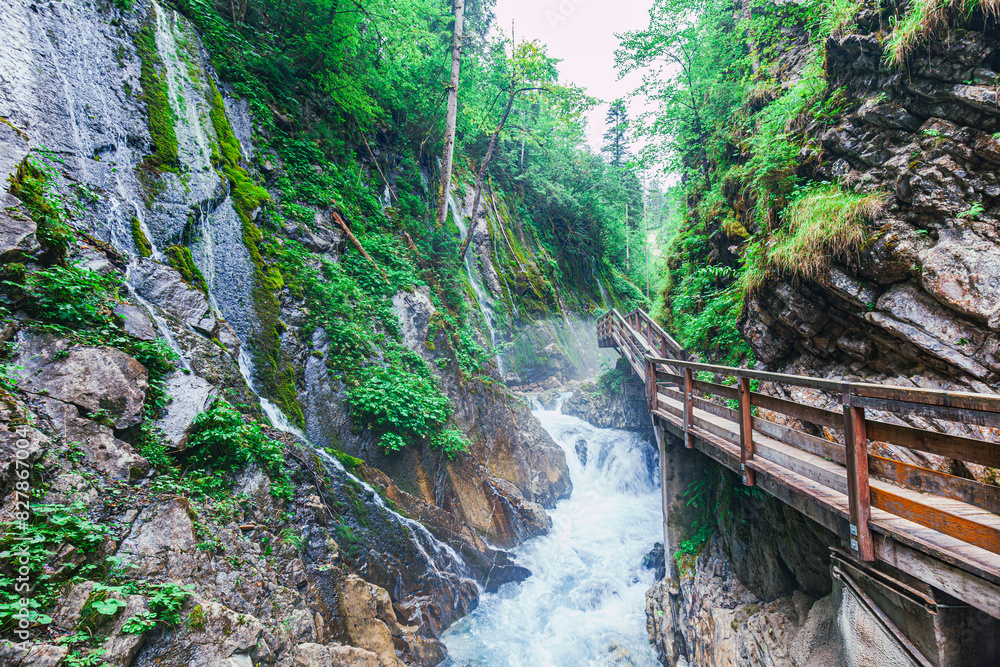 hiking trough the natural spectacle Wimbachklamm, Gorge in the mountaineering village Ramsau near Berchtesgaden. Wimbachtal lies at the foot of the Watzmann. Wimbachklamm is 200 meters long hiking trough the natural spectacle Wimbachklamm, Gorge in the mountaineering village Ramsau near Berchtesgaden. Wimbachtal lies at the foot of the Watzmann. Wimbachklamm is 200 meters long