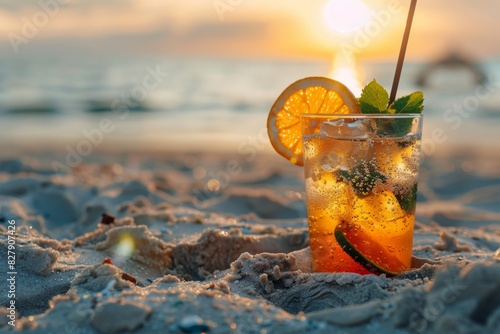 Orange margarita cocktail on sandy beach background. Glass of juice with ice cubes. Tropical drink for summer party. Alcoholic vacation at resort. Refreshing beverage concept. Banner with copy space