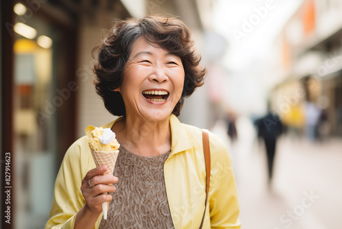 Middle aged Chinese woman at outdoors with a cornet ice cream