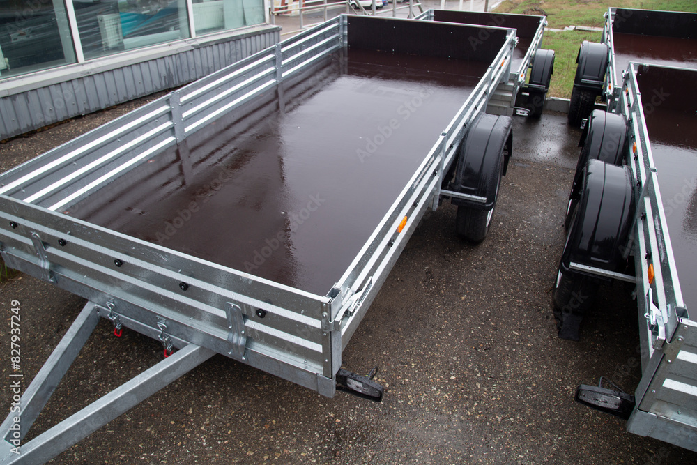 Obraz premium Open road trailer. Shop selling car trailers.