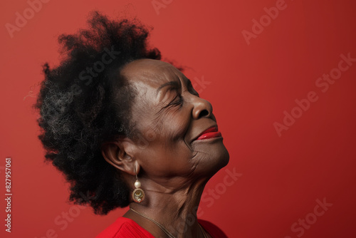 Wallpaper Mural A close up of a black woman's face with her eyes closed looking to a side Torontodigital.ca