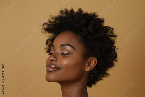 A close up of a black woman's face with her eyes closed looking to a side