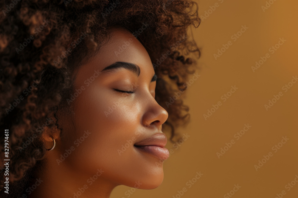 A close up of a black woman's face with her eyes closed looking to a side A close up of a black woman's face with her eyes closed looking to a side