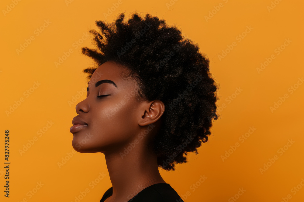 A close up of a black woman's face with her eyes closed looking to a side A close up of a black woman's face with her eyes closed looking to a side