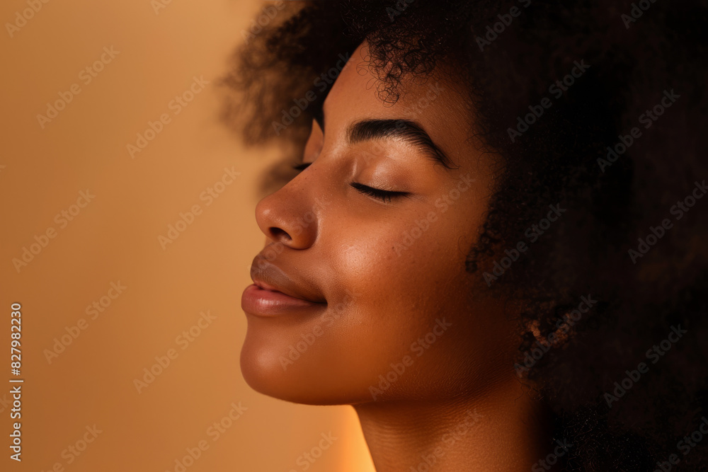 A close up of a black woman's face with her eyes closed looking to a side A close up of a black woman's face with her eyes closed looking to a side