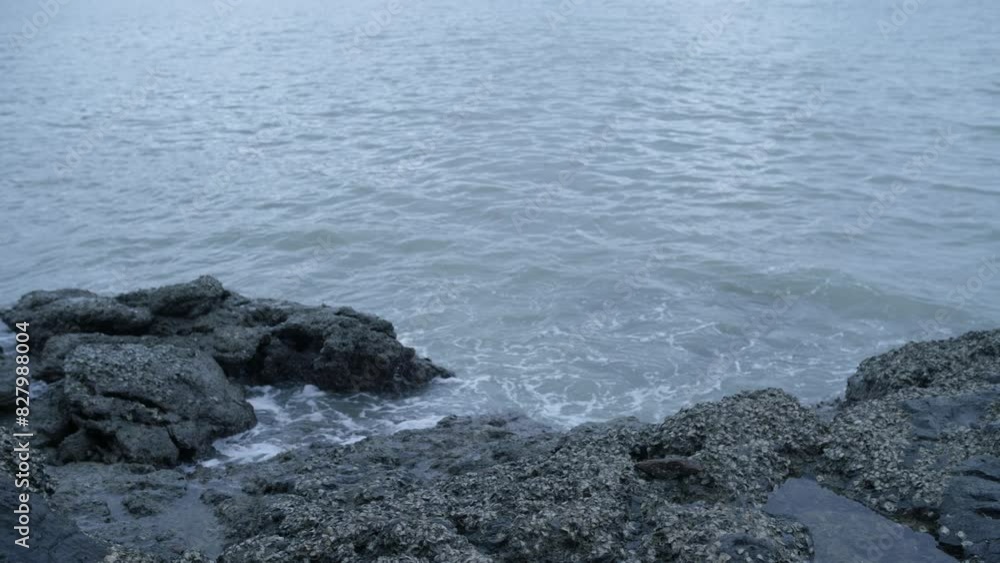 rocks and sea in the evening and in low light rocks and sea in the evening and in low light