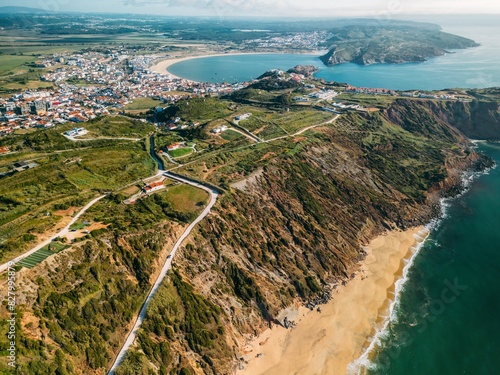 Aerial drone view of Praia da Gralha looking towards Sao Martinho do Porto, Portugal photo
