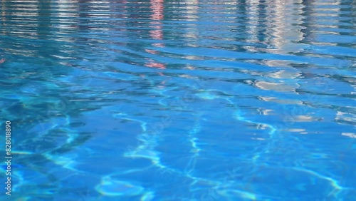 Wallpaper Mural Waves on clean fresh blue water in a pool, pond. Water background for vacation and summer holidays, reflection, Natural resources Torontodigital.ca