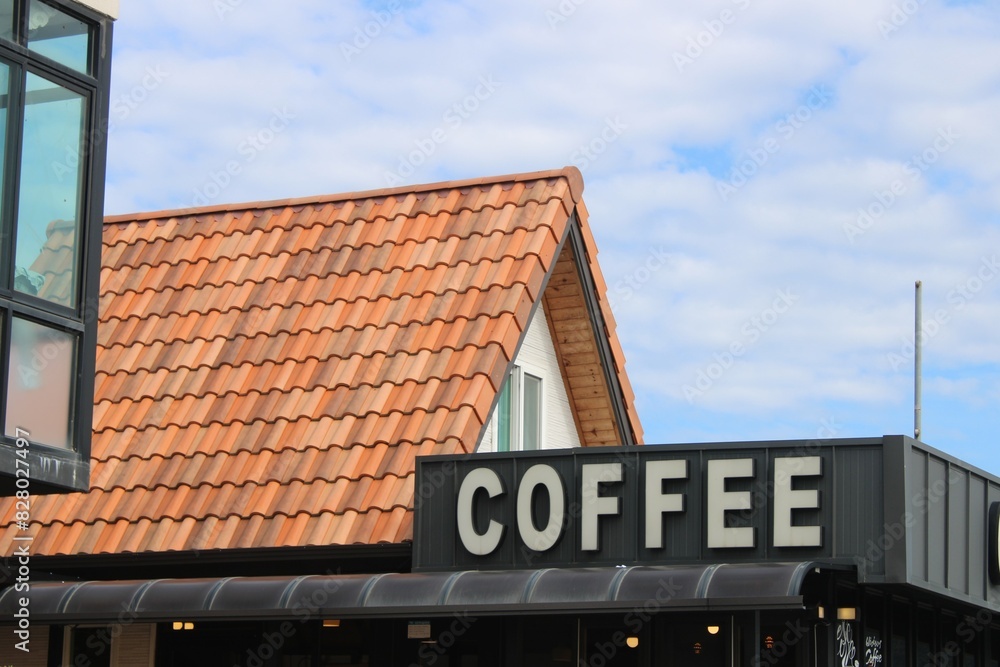 Obraz premium Rooftop Coffee shop sign in the country