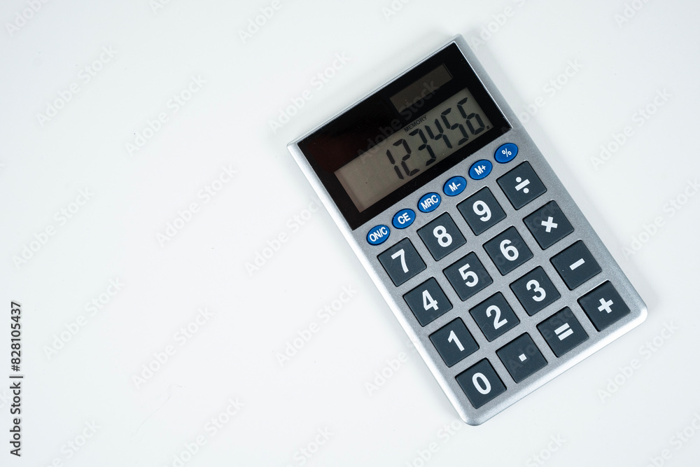 A Calulator Isolated On A White Background Angled From Left To Right With Room For Copy A Calulator Isolated On A White Background Angled From Left To Right With Room For Copy