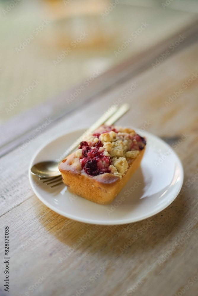 blueberry crumble cake in white plate blueberry crumble cake in white plate
