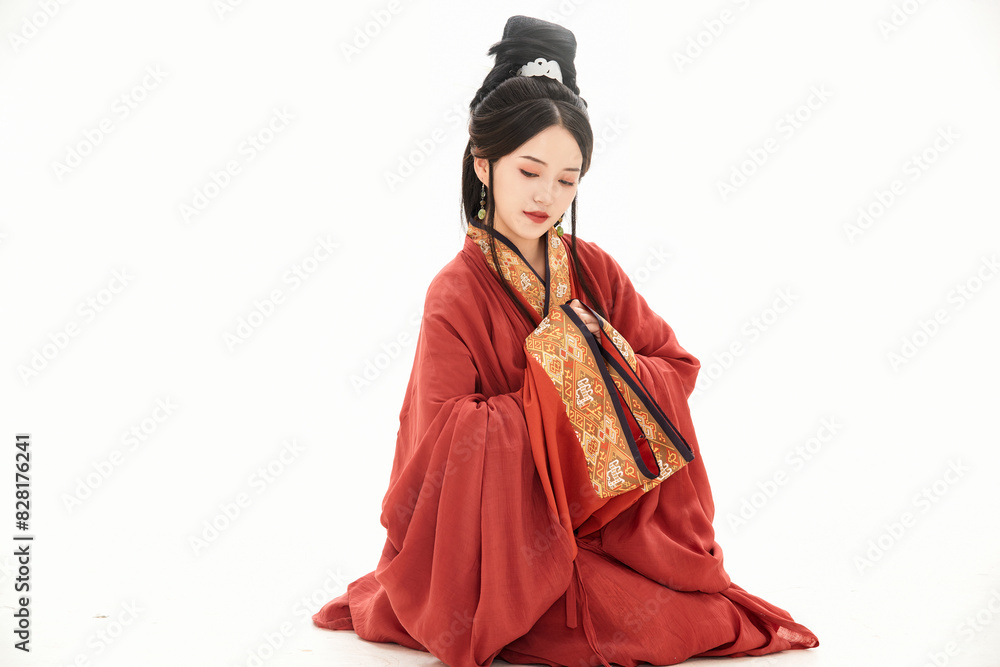 A woman wearing ancient Chinese clothing against a white background.