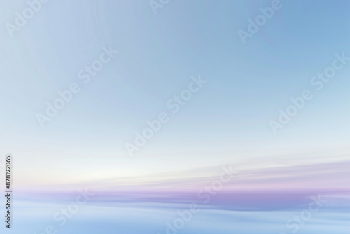 Serene sky blue and lavender gradients in an abstract blur for peaceful designs.