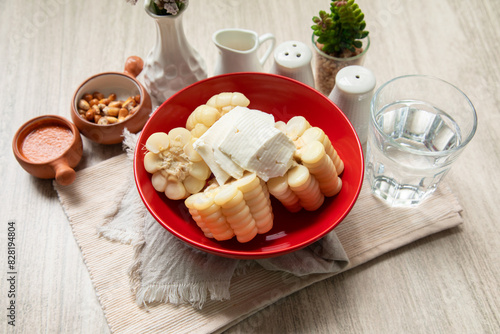 Fotografi Cooked corn with pieces of un salted cheese andean food peru peruvian