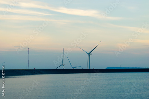 wind turbines produce electricity, clean energy.