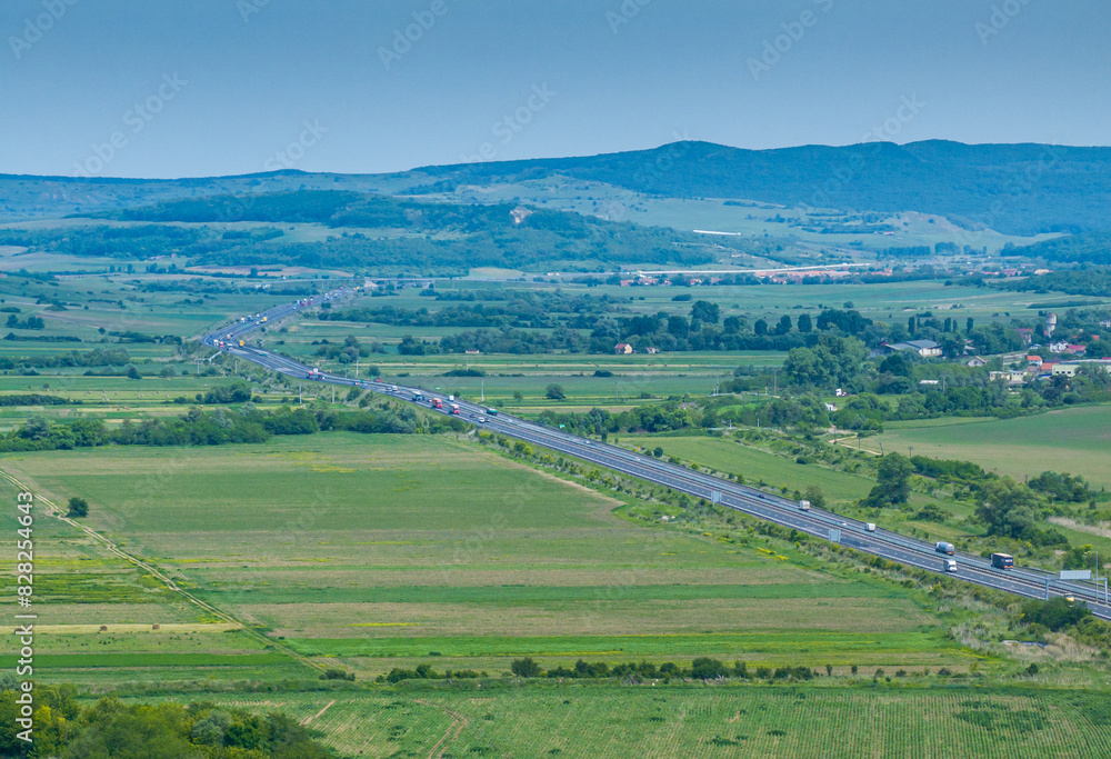 Romania highway. Aerial view of A1 highway that connects Sibiu with Sebes and Alba-Iulia cities from Transylvania. Roads of Romania. Romania highway. Aerial view of A1 highway that connects Sibiu with Sebes and Alba-Iulia cities from Transylvania. Roads of Romania.