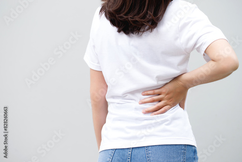 Lower back pain is usually caused by a muscle injury. broken pillow © methaphum