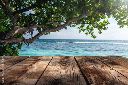 Empty wooden table or pier with sunny beach and sea on background. With copy space for your product