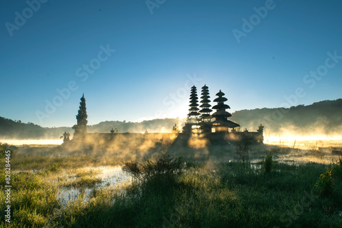 beautifull sunrise at tamblingan temple photo