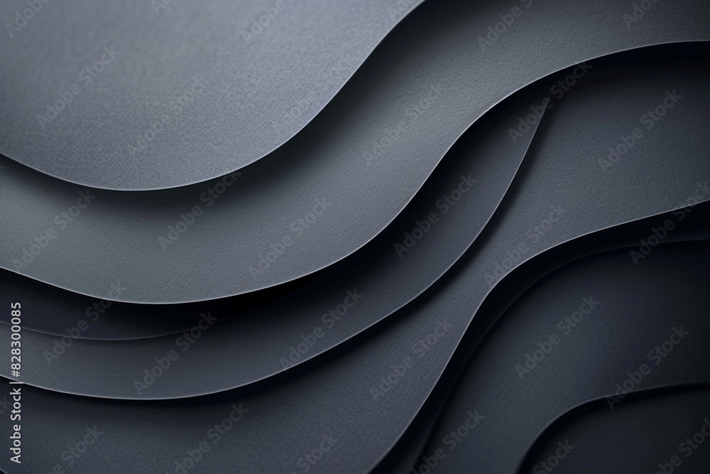 Elegant paper cut design in charcoal grey for corporate identity materials. Elegant paper cut design in charcoal grey for corporate identity materials.