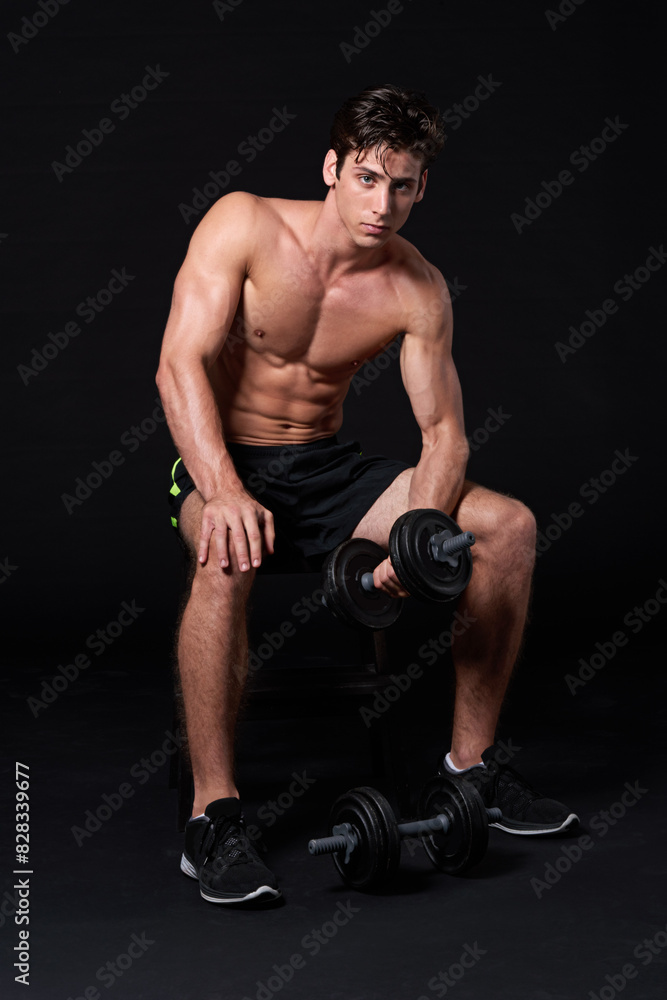 Body, dumbbell and fitness with portrait of man in studio isolated on black background for health or wellness. Exercise, muscle or strong with shirtless athlete in dark for weight training or workout Body, dumbbell and fitness with portrait of man in studio isolated on black background for health or wellness. Exercise, muscle or strong with shirtless athlete in dark for weight training or workout