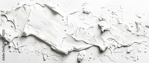 Abstract white paint texture with brushstrokes on a white surface