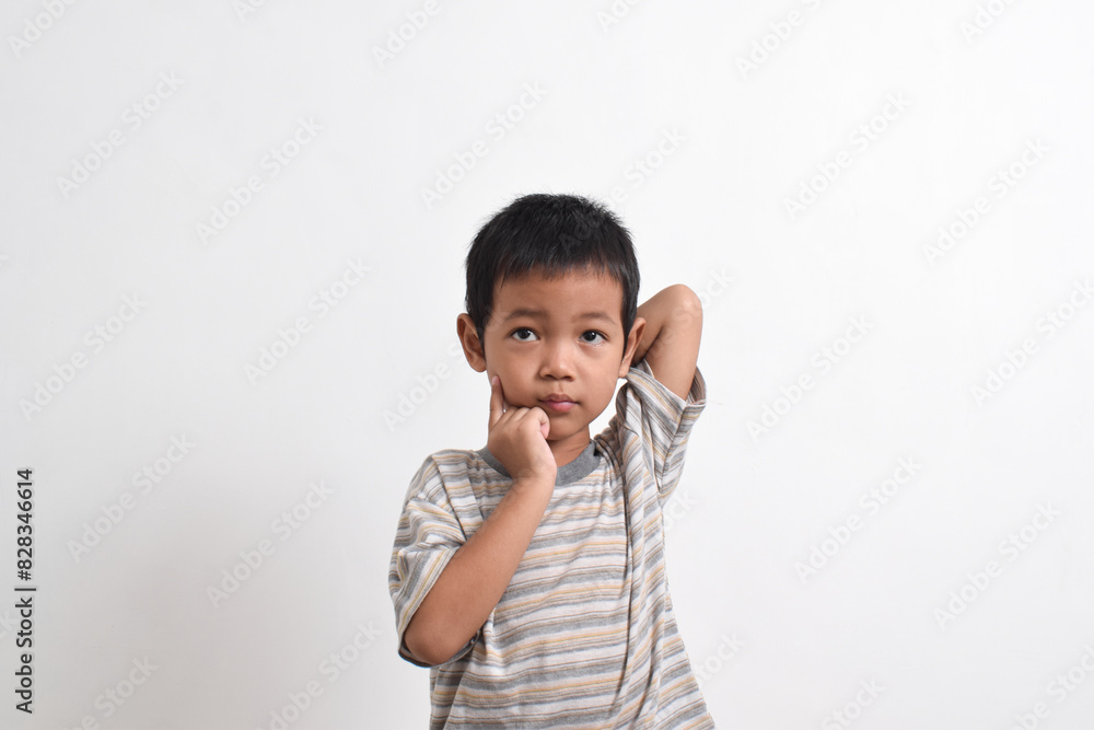Image of Asian child posing cutely on white background. portrait of an Asian boy Image of Asian child posing cutely on white background. portrait of an Asian boy