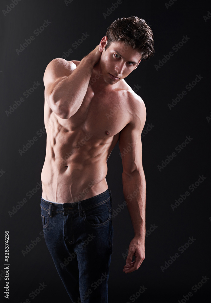 Portrait, man and strong body in studio for fitness, workout and exercise or wellness. Bodybuilder, athlete and progress by black background for performance, training and jeans with confidence Portrait, man and strong body in studio for fitness, workout and exercise or wellness. Bodybuilder, athlete and progress by black background for performance, training and jeans with confidence