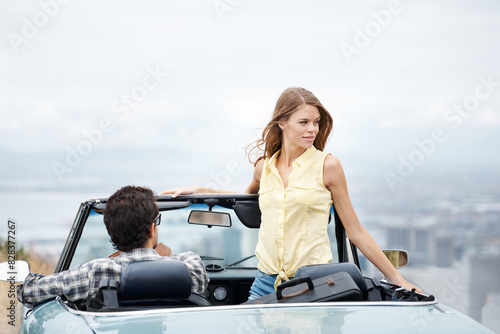 Road trip, city and couple in car on holiday, vacation and adventure for bonding, relax and honeymoon. Travel destination, dating and man and woman in vehicle for transport, journey and driving © peopleimages.com