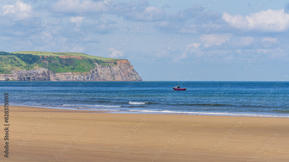 Fototapeta premium View towards Sandsend from the beach in Whitby