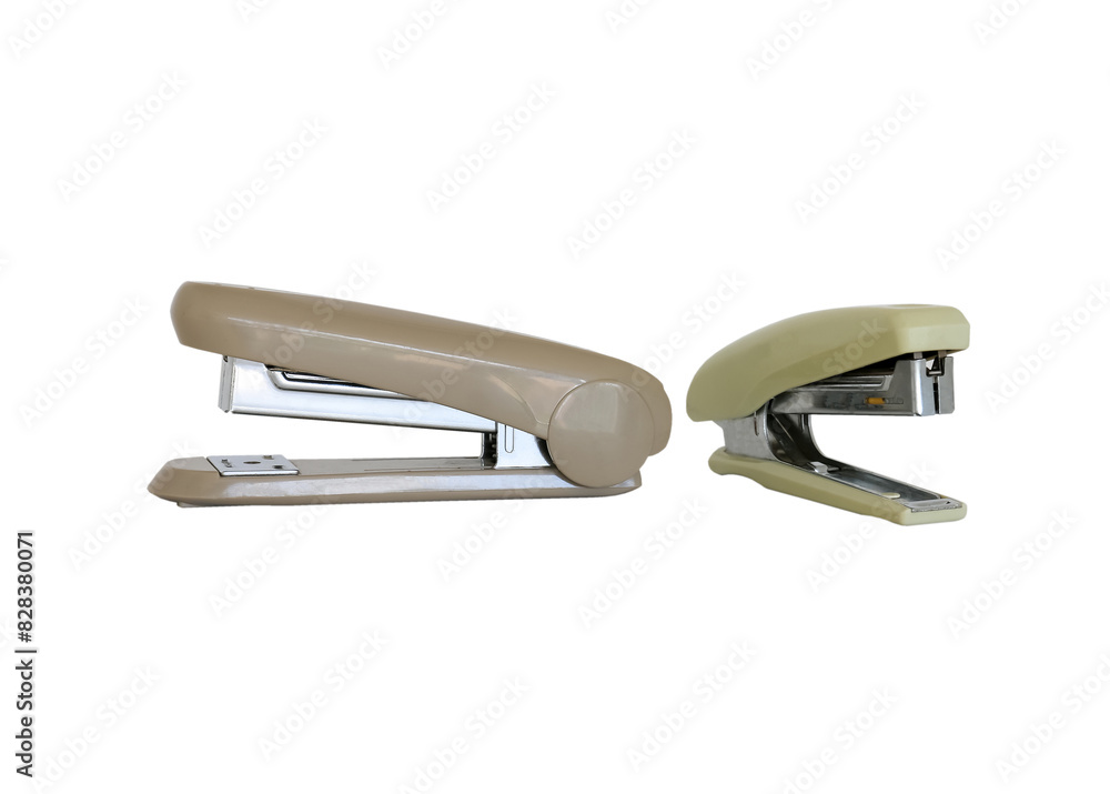 Photo of khaki stapler isolated on a white background, is a device used in schools or offices. Photo of khaki stapler isolated on a white background, is a device used in schools or offices.