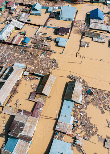 Canvas-taulu flood in the spring in the suburbs of a large city with flooding of the private