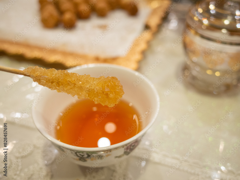 uyghur hot tea with blown sugar stick uyghur hot tea with blown sugar stick