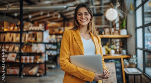 Woman Holding Laptop in Store