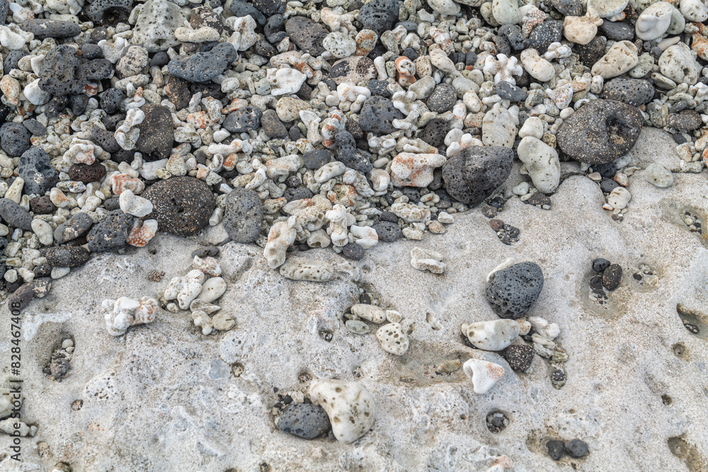 Beachrock is a friable to well-cemented sedimentary rock that consists of a variable mixture of basalt gravel , sand , and silt-sized sediment. fragments of coral and shells . Geology
Beachrock is a friable to well-cemented sedimentary rock that consists of a variable mixture of basalt gravel , sand , and silt-sized sediment. fragments of coral and shells . Geology