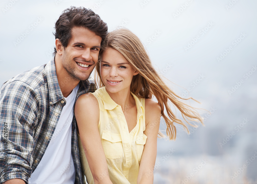 Couple, happy hug and portrait outdoor for summer vacation for love, freedom and adventure together. Care, man and woman travel for holiday, people and outside for engagement celebration with smile